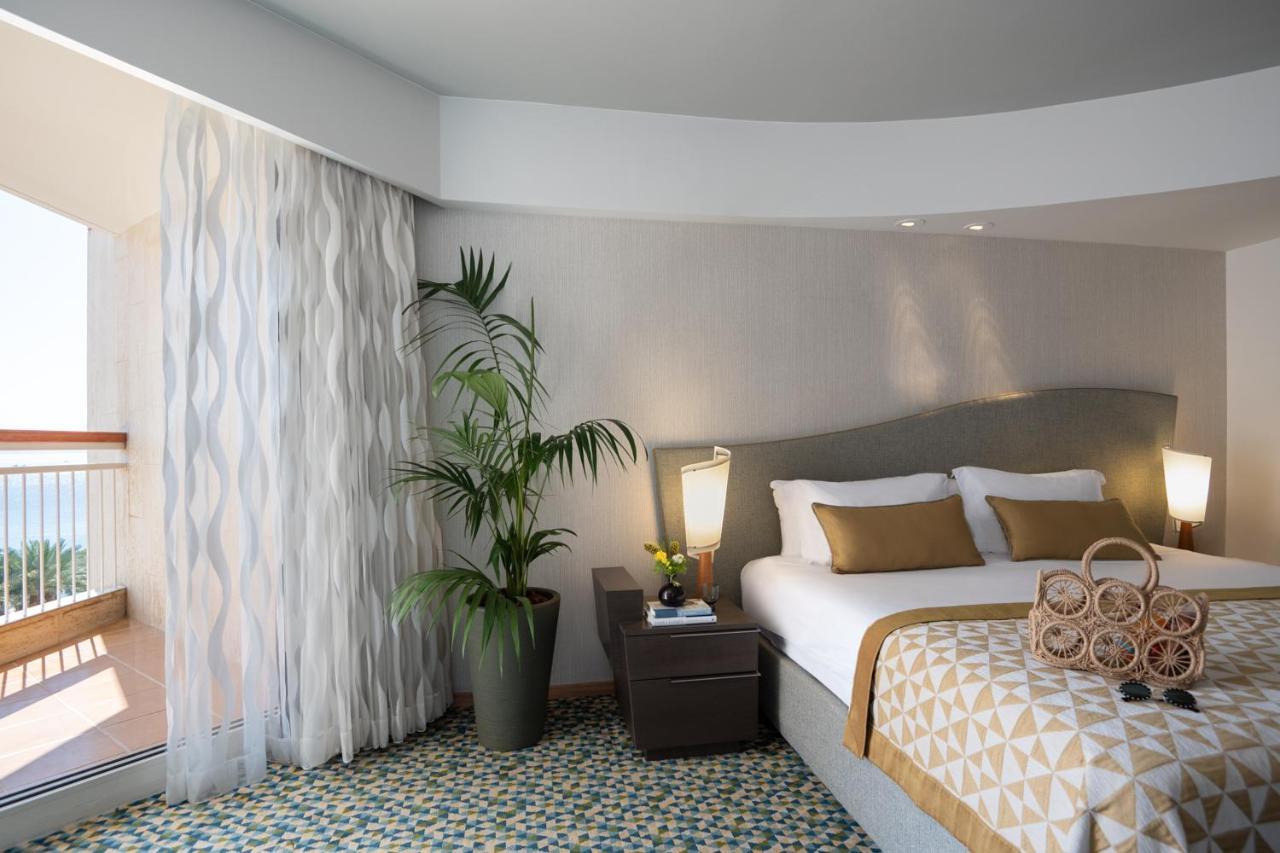Dan Eilat Hotel Exterior foto A bedroom at the hotel