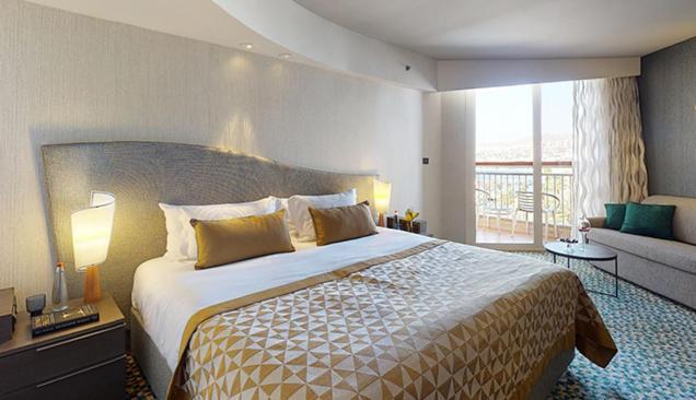 Dan Eilat Hotel Exterior foto A bedroom at the hotel