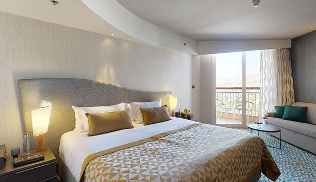 Dan Eilat Hotel Exterior foto A bedroom at the hotel