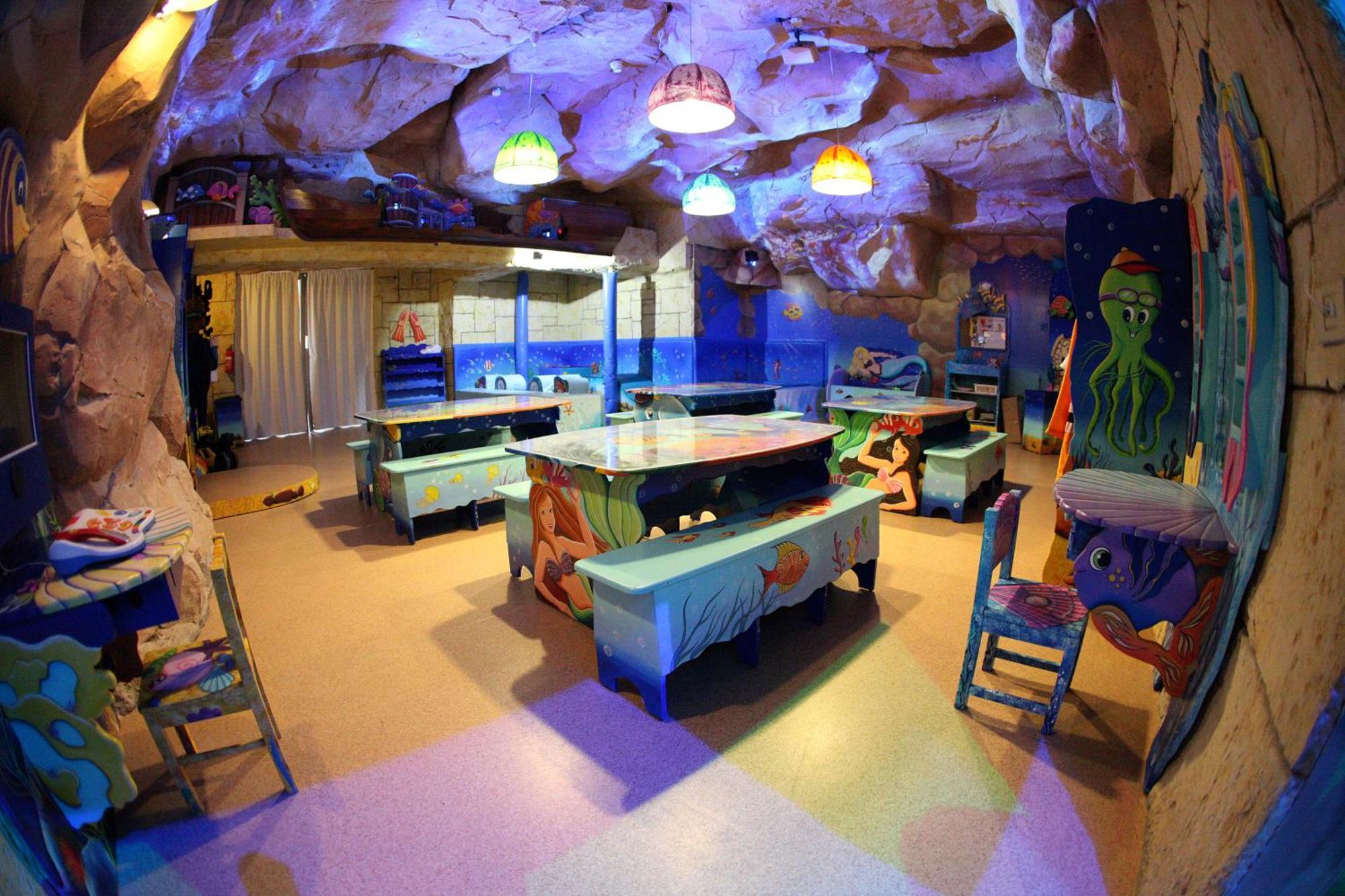 Dan Eilat Hotel Instalações foto The interior of the restaurant